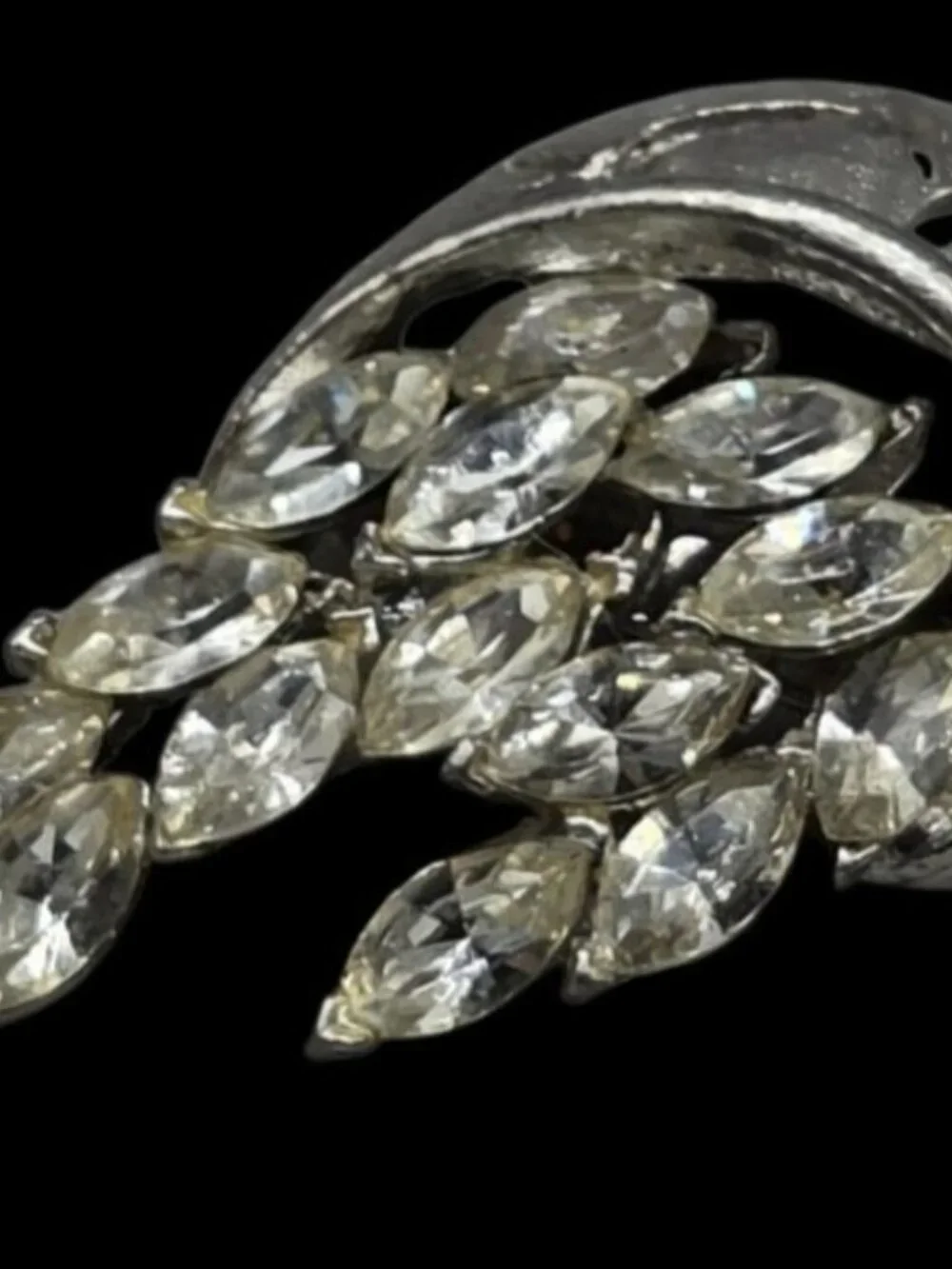 None this brooch